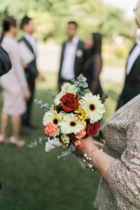 mother of the bride with bouquet