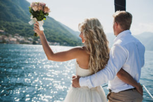 couple getting married on a yacht
